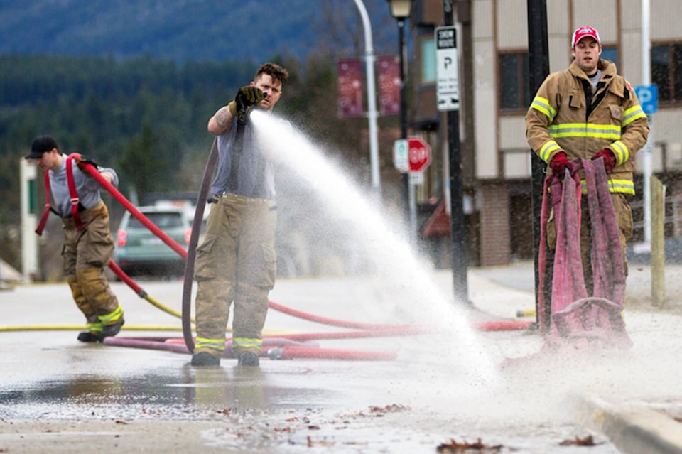 11432729_web1_180418-SAA-Firefighter-Street-cleaning-file-photo