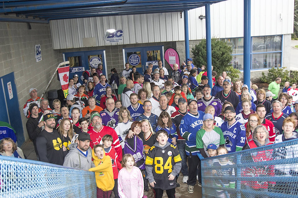 The community of Salmon Arm came together in a big way on April 12 for the nation-wide Jersey Day, where communities were encouraged to wear sports jerseys to show their support for those affected by the Humboldt Broncos bus crash. Over 100 people gathered at the Shaw Centre in jerseys to be part of a group photo which will be framed and sent to the Humboldt Broncos. (Jodi Brak/Salmon Arm Observer)