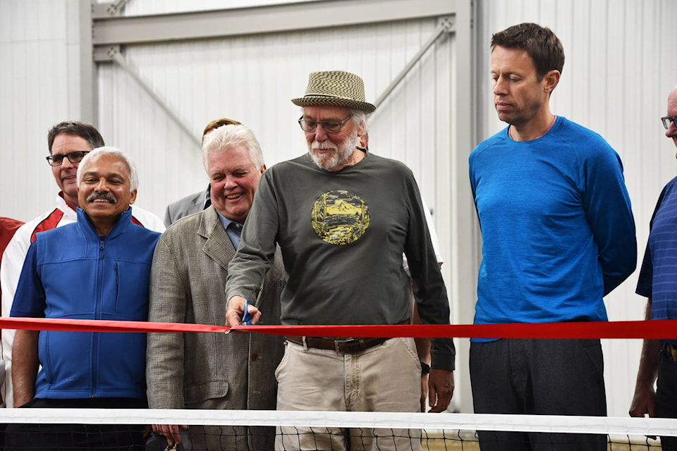 David Askew cuts the ribbon at the grand opening for the Salmon Arm Tennis Club’s indoor facility on Saturday, June 8. From left, Winston Pain, George Elamatha, Don Ross and Daniel Nestor. (Cameron Thomson/Salmon Arm Observer)