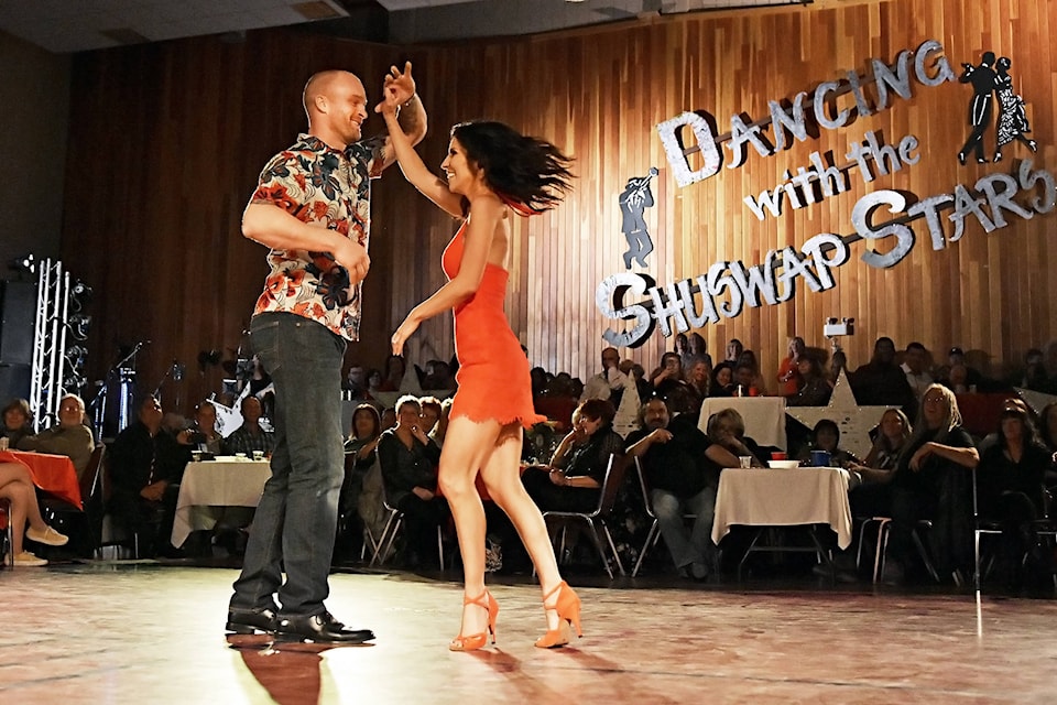 Dancing up a storm Josh and Joanna Bickle’s slow, sensual dance moves win over the judges and audience alike at Dancing with the Shuswap Stars held in the SASCU Recreation Centre on Friday, Nov. 22. The Bickles won the couples category, and tied for Judges’ Choice with Riley Boudreau and Sarah Froud. See more photos on page 11. (Lachlan Labere - Salmon Arm Observer)
