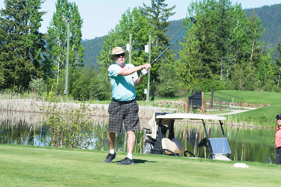 John Watters tees off on the Hyde Mountain Golf Course on Sunday, May 13. (Jim Elliot/Eagle Valley News)