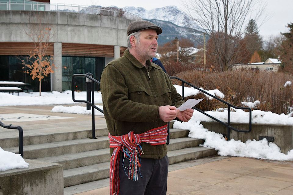 David Allard, president of the Salmon Arm Métis Associaition, speaks of Louis Riel’s importance before the Métis flag is raised at Salmon Arm city hall on Nov. 16, 2020 in recognition of Louis Riel Day in B.C. (Martha Wickett - Salmon Arm Observer)