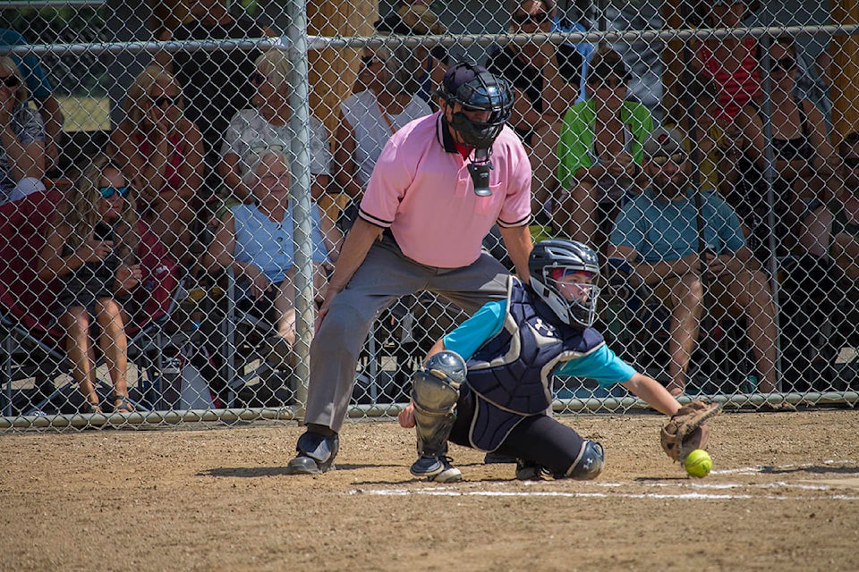 Enderby Storm catcher Lexi Derksen receives a pitch in Enderby on July 10, 2021. (Zachary Roman-Salmon Arm Observer)