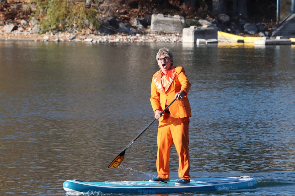 A man in an orange tuxedo who said he was Jim Carrey’s character in the movie Dumb and Dumber was one of more than 40 participants in a Halloween paddle on Kal Lake Sunday afternoon, Oct. 31. (Roger Knox - Morning Star)