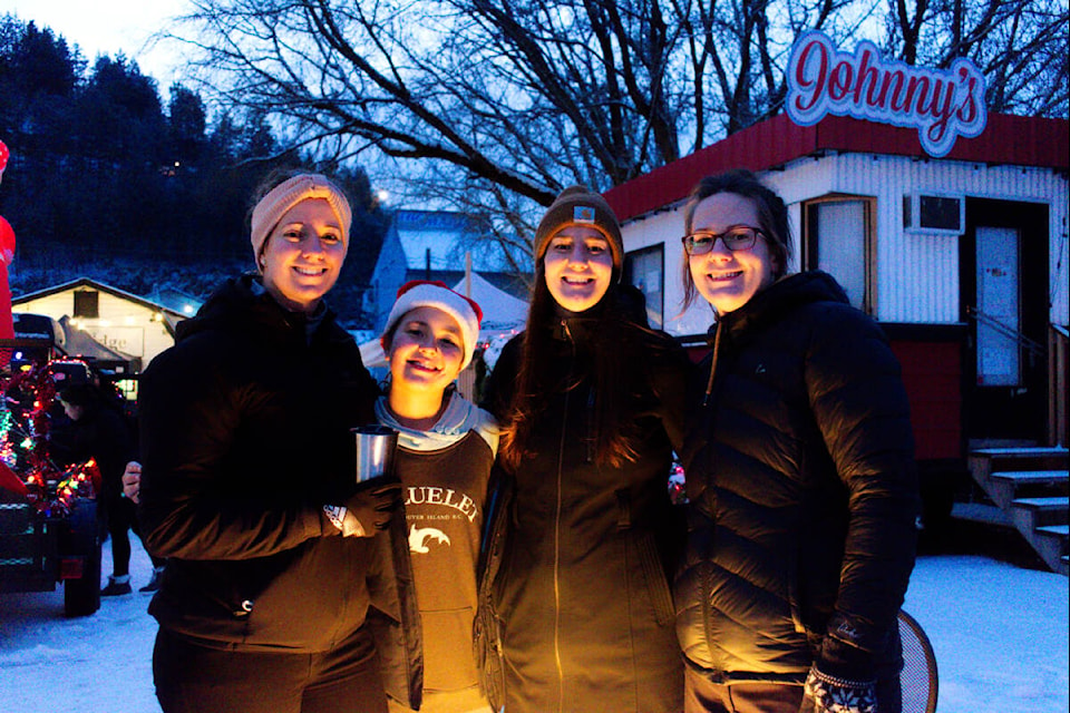 From left: Chelsea Dejager, Marley Ormondy, Jenna Ormondy and Amanda Jones came to enjoy the Christmas market at Bruhn Crossing in Sicamous on Dec. 4, 2021. (Zachary Roman/Eagle Valley News)