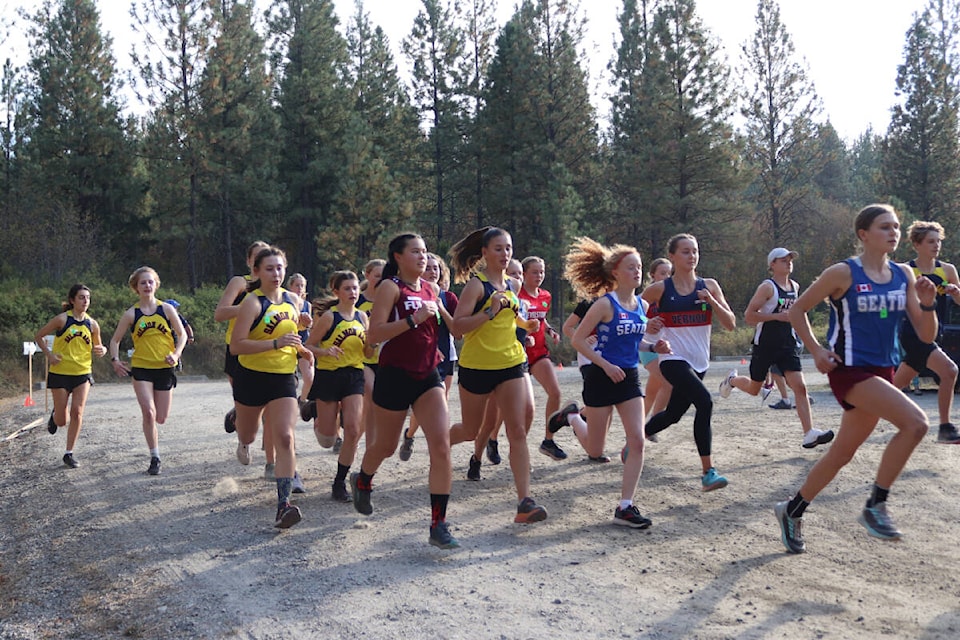 Senior runners head out on their five-kilometre course during the first North Zone high school cross-country event of the season Wednesday, Sept. 28, at Coldstream’s Kal Lake Provincial Park. (Brendan Shykora - Black Press)