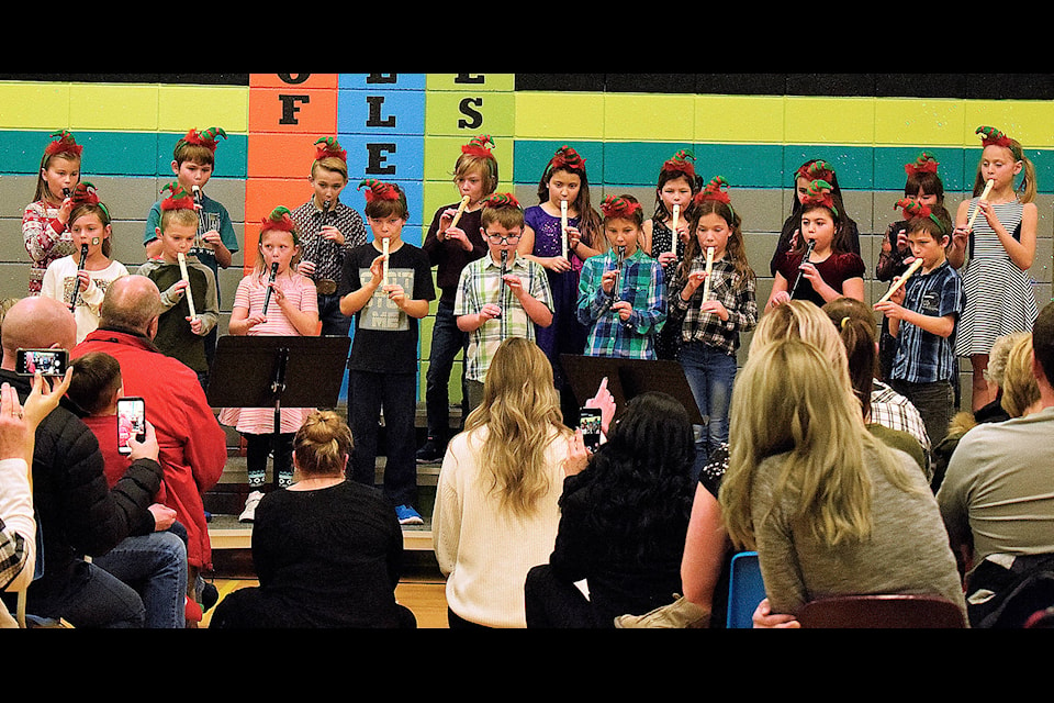 Eckville Elementary School’s Grade 3 class played “Jingle Bells” on the recorder during the school’s Christmas Concert on Dec. 20. The Grade 3’s also recited a poem called “Merry Christmas” written by the class and sang “We Wish You a Merry Christmas.” Photo by Kaylyn Whibbs/Eckville Echo