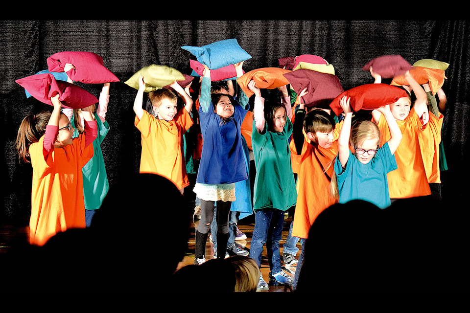 Students lift pillows, which were representing weights, over their heads in their Trickster Theatre skit. The students of Eckville Elementary School and Trickster Theatre presented “The Road to Becoming a Champion” on Jan. 25. With the help of their Trickster Theatre artist each class performed a skit for parents, friends and school staff. Photo by Kaylyn Whibbs/Eckville Echo