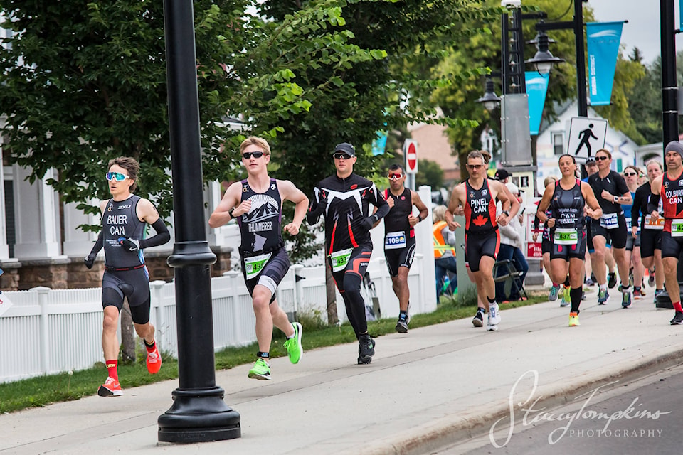 Athletes take to the streets of Sylvan Lake on Aug. 11 during this year’s Multi-Sport at the Lake event. Photo Courtesy of Stacey Tompkins Photography.