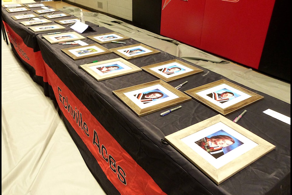 A table full of Eckville Junior Senior High School’s grad photos was set up as a gift to the graduating students at the graduation ceremony on May 28. The grad ceremony was done in the school’s gymnasium rather than the community centre. (Photo Submitted)