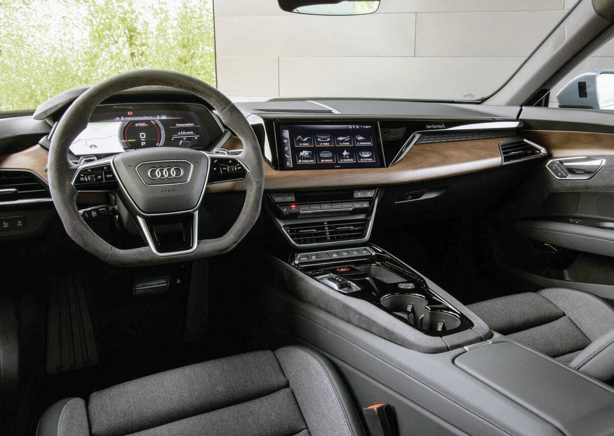 The premium-look dashboard has a configurable 12-3-inch drivers digital instrument display located behind the flat-bottom steering wheel, and beside it theres a straightforward 10.1-inch touch-screen. PHOTO: AUDI