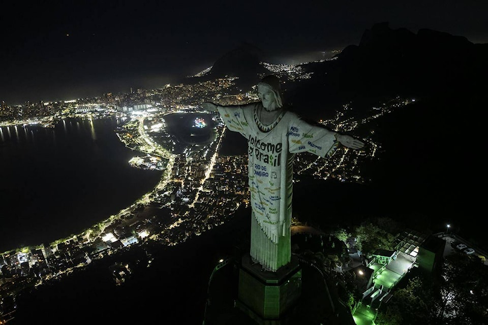 The Christ the Redeemer statue is illuminated with a welcome message for American singer Taylor Swift, in Rio de Janeiro, Brazil, Thursday, Nov. 16, 2023. (AP Photo/Bruna Prado)