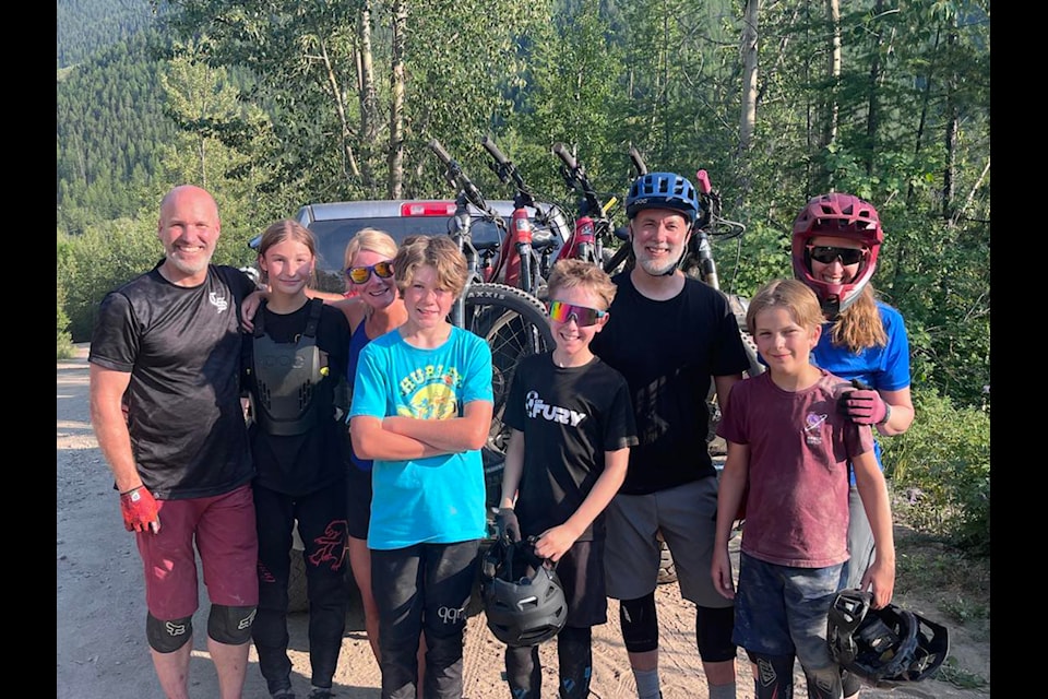 The Proulx and Angers families were among those who attended the grand opening of the fully completed mountain bike route, "Trail Dogs," above Coal Creek Rd