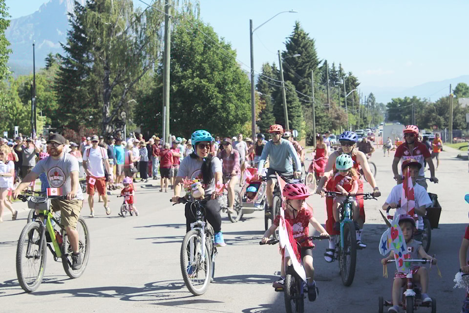 Locals show their red and white colours at the Canada Day bike parade (Gillian Francis/TheFreePress)