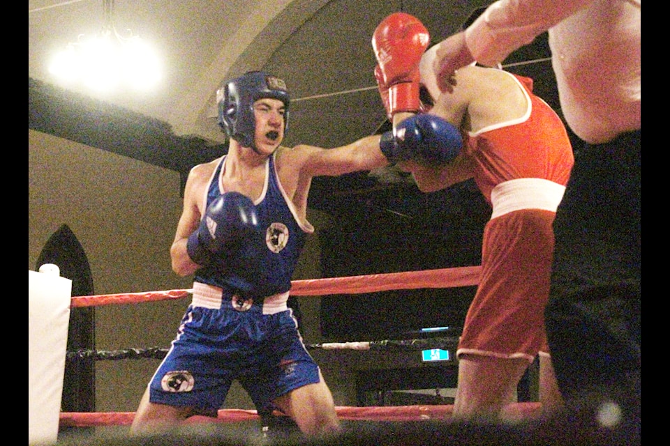 Fernie's Arlo Jamin throws a punch at Marco Ramos from Penticton's Tondo Boxing Club at Rumble at the Knox on Mar. 8 (Gillian Francis/TheFreePress)