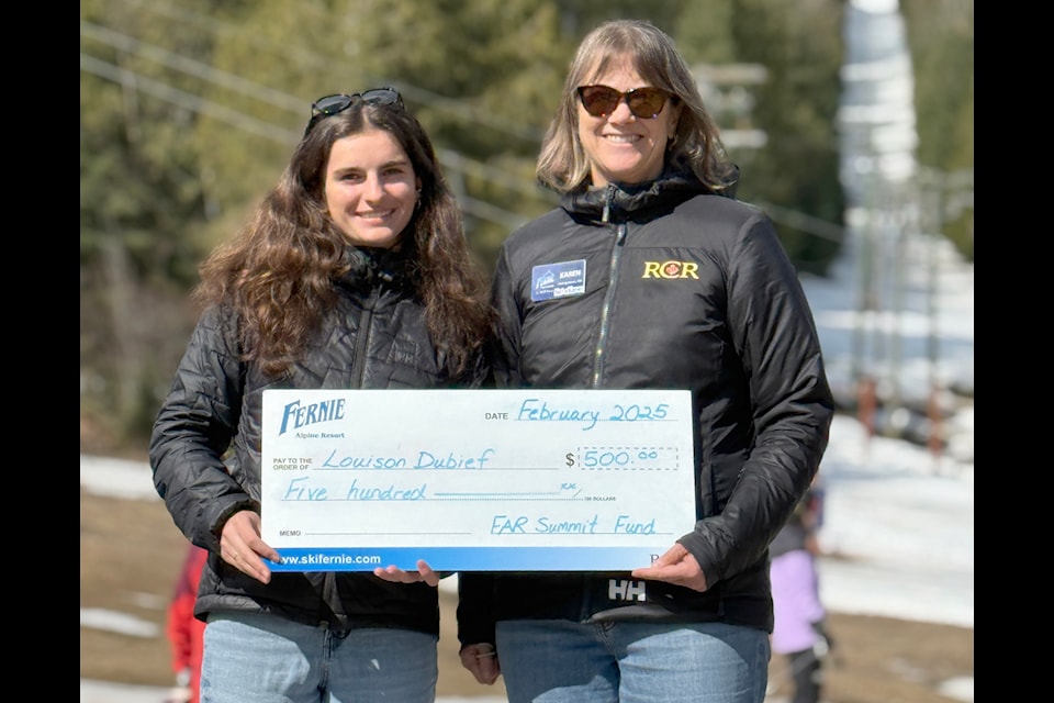 FAR staff member Karen Pepper presents nordic ski athlete Louison Dubief with a cheque for $500 (submitted)
