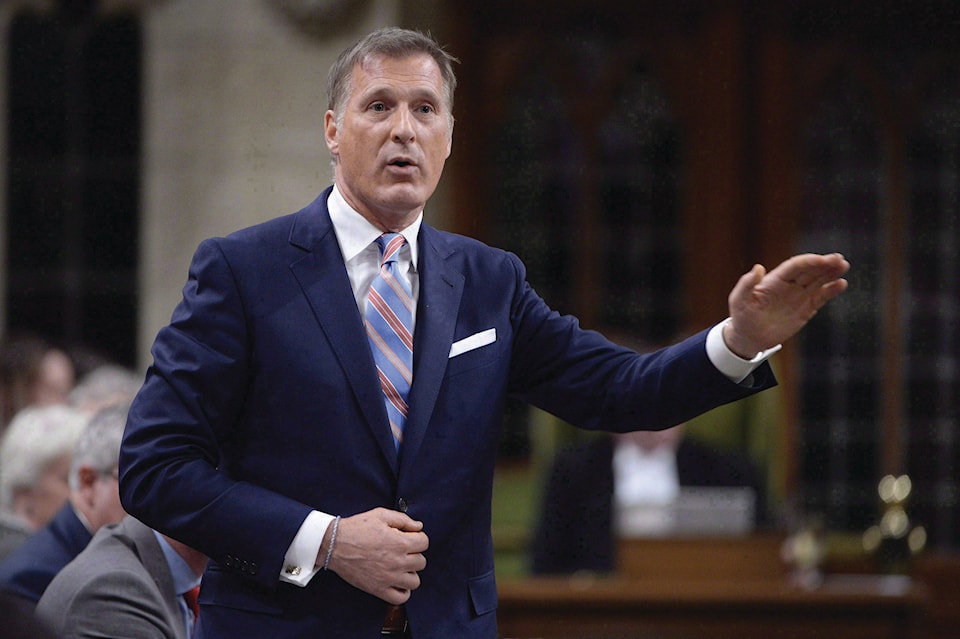 13187697_web1_180614-RDA-Canada-Bernier-Booted-PIC