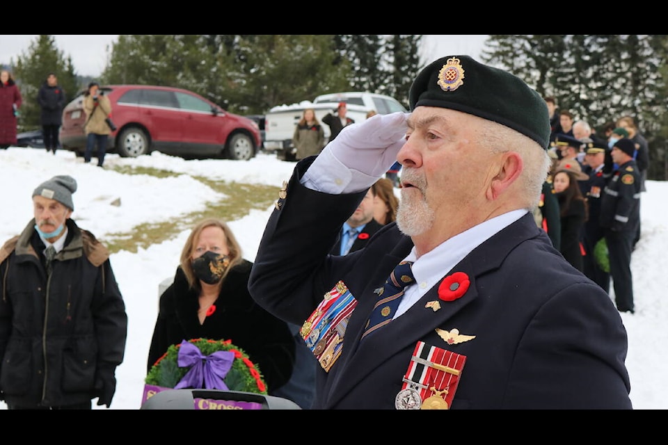 Reginald Lafreniere, who had a long career in the military and is a sergeant-at-arms with the Legion, salutes as O’Canada is sung at the 2021 Remembrance Day ceremony in Fernie. (Joshua Fischlin/The Free Press)