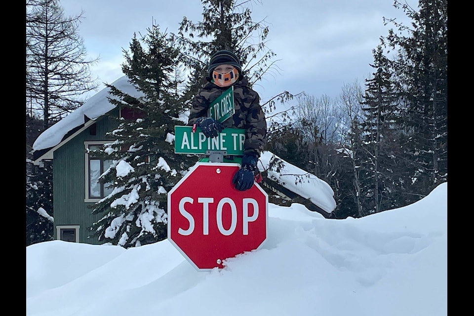 Laszlo Gyorki showing off how high the snow was piled in Fernie. (Jikke Gyorki, Fernie)