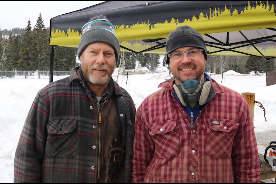 Fernie woodcarvers Michael Penny and Dave Richards participate in Elkford’s ‘Winter in the Wild’ 2022. (Joshua Fischlin/The Free Press)