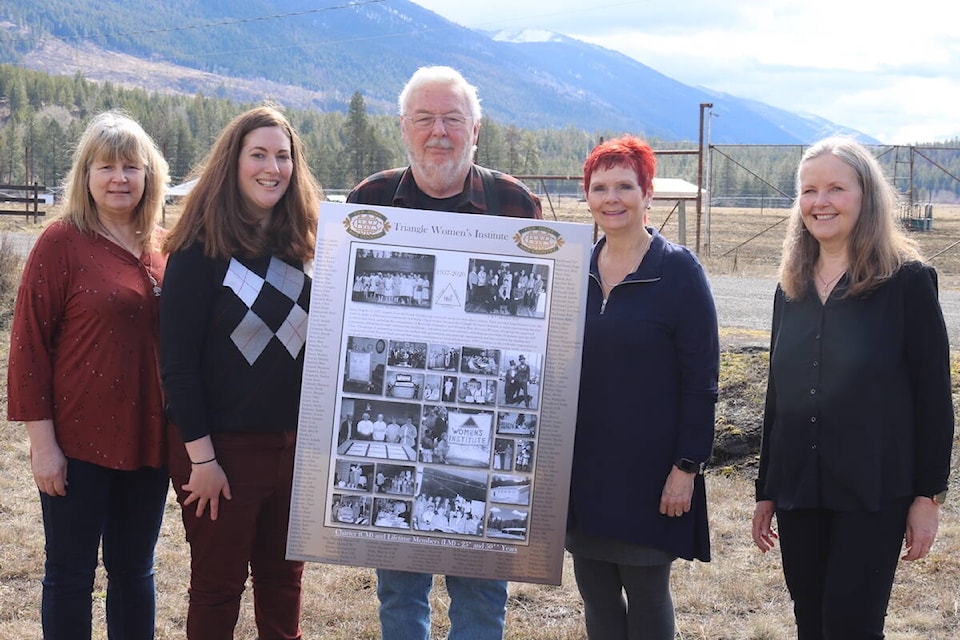 Members of the Triangle Women’s Institute and historians from the Columbia Basin Institute of Regional History hold up the final finished plaque of phase one of their community history commemoration project. Five plaques are now hung up in Grasmere’s Pioneer Hall, and more are on the way. Left to right: Heather Serafini, Erin Knutson, Derryll White, Judy-Lou McDonald, Cathy Betteridge. (Joshua Fischlin/The Free Press)