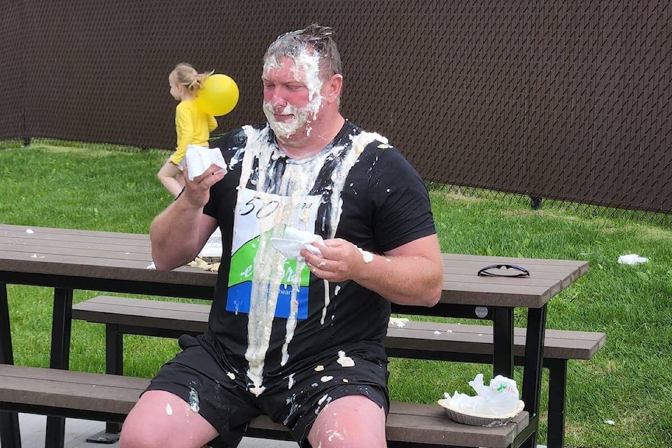 District of Elkford councillor Len Gostick took three pies to the face to fundraise for the Elkford bike park project on Saturday, July 2, during Elkford’s Wildcat Days celebrations. (Courtesy of Jason Meldrum)