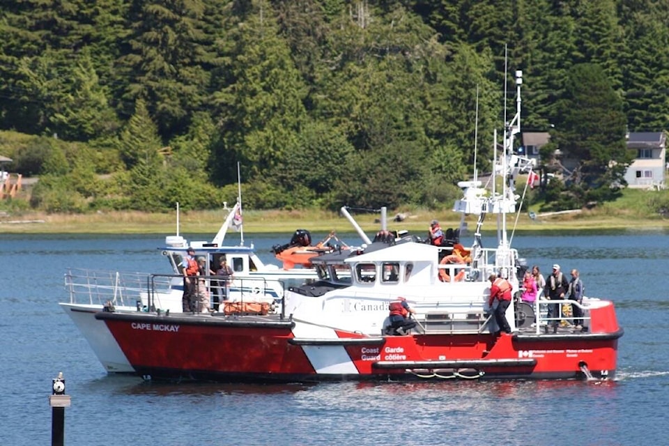 CCGS Cape McKay and 24 passengers and crew aboard the MV Chinook Princess arrive safely in the Ucluelet Harbour on July 30. (Cathy Gilbert photo)