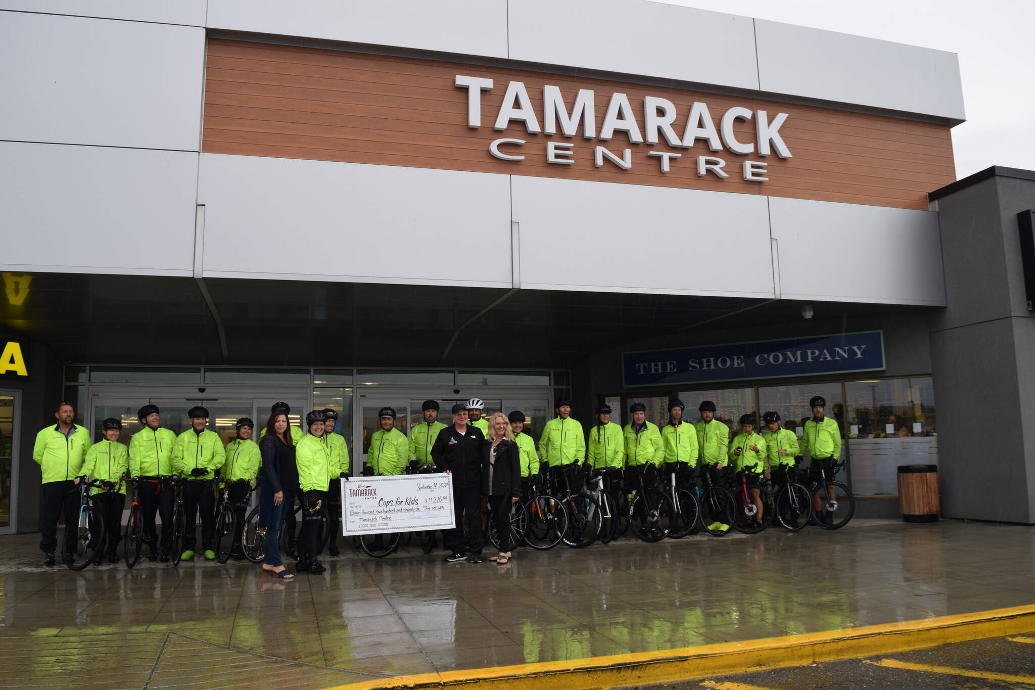 The Cops for Kids ride stopped in Cranbrook on Wednesday, Sept. 14 where they were greeted with a cheque from the Tamarack Centre for $11,276. The funds were raised through the malls Party in the Parking Lot party in August. (Corey Bullock/Cranbrook Townsman)