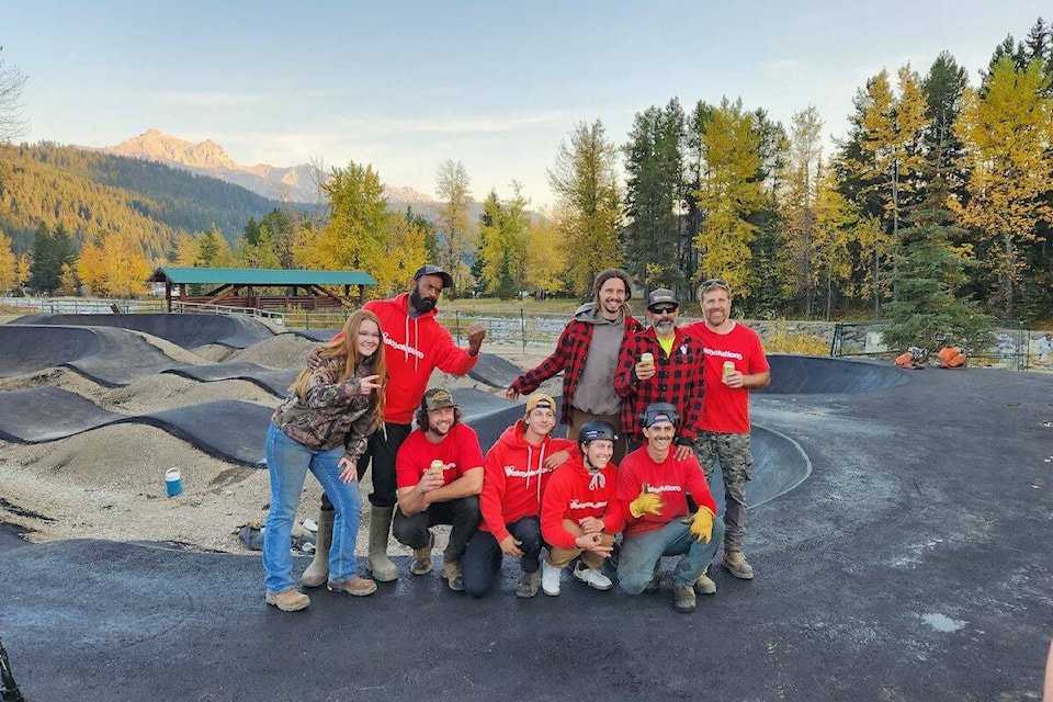 Workers who helped pave the surface at Elkford’s brand new bike park in October 2022. (Contributed)