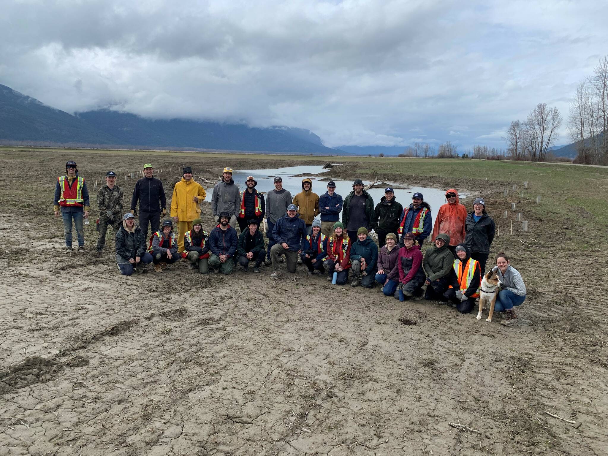 A group of students helped with the planting of native shrubs at the Frog Bear Conservation Corridor on April 21. (Photo courtesy of Nature Conservancy of Canada)