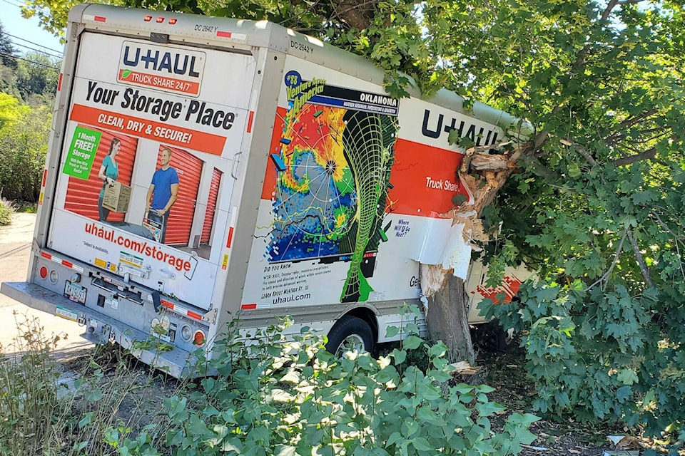 A U-Haul left Okanagan Landing Road hitting a tree Wednesday afternoon. (Roger Knox - Morning Star)