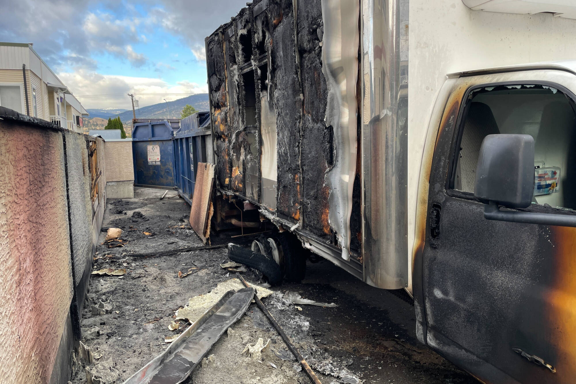 The remains of several storage bins and the Salvation Armys truck after a late night fire in Penticton on Oct. 26. (Brennan Phillips - Western News)