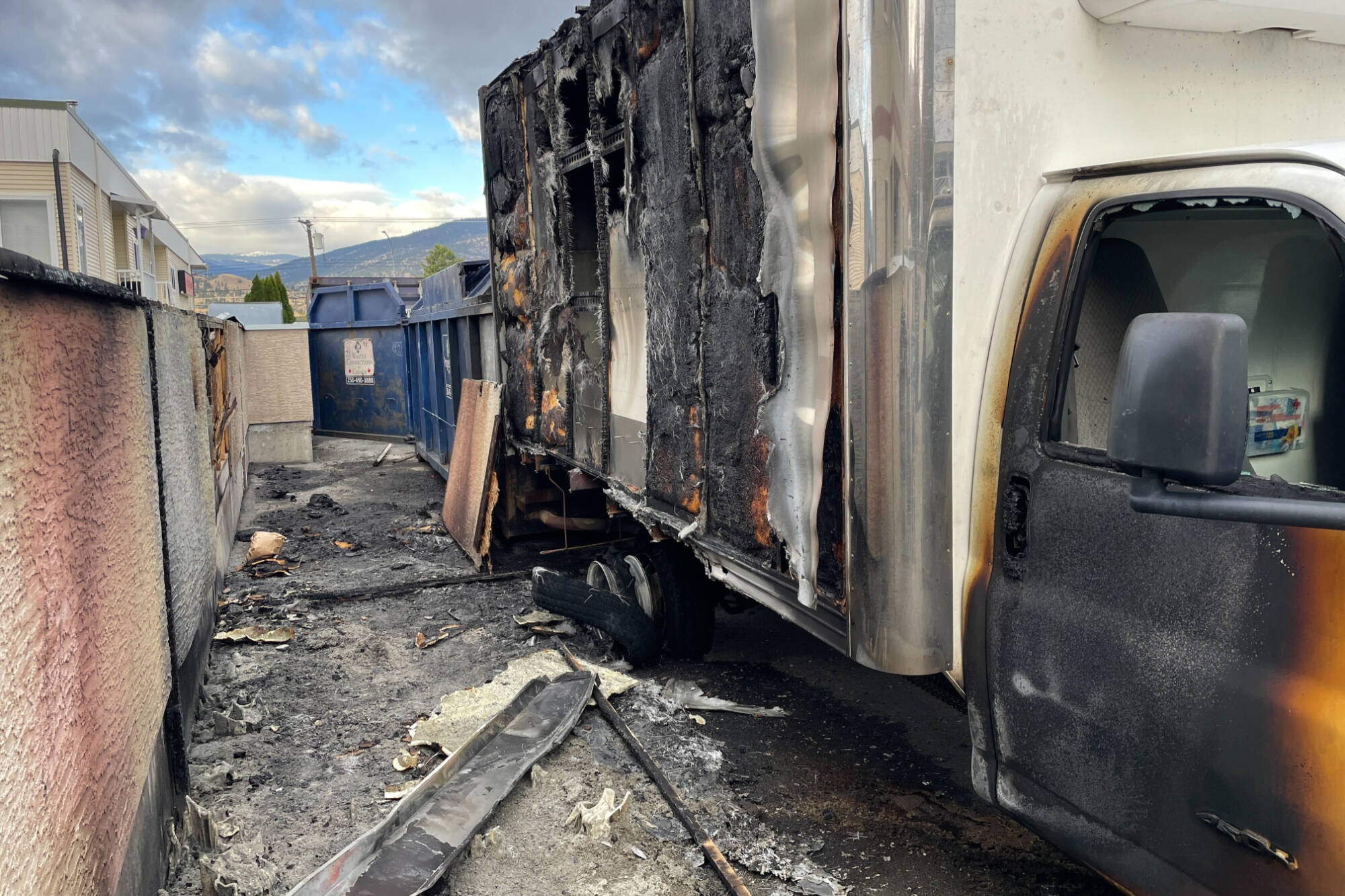 The remains of several storage bins and the Salvation Armys truck after a late night fire in Penticton on Oct. 26. (Brennan Phillips - Western News)