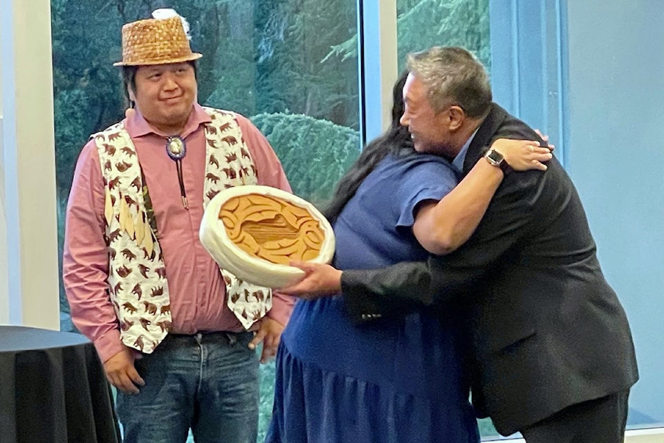 Songhees Councillors Garry Sam and Margaret Charlie with Colwood Mayor Doug Kobayashi.