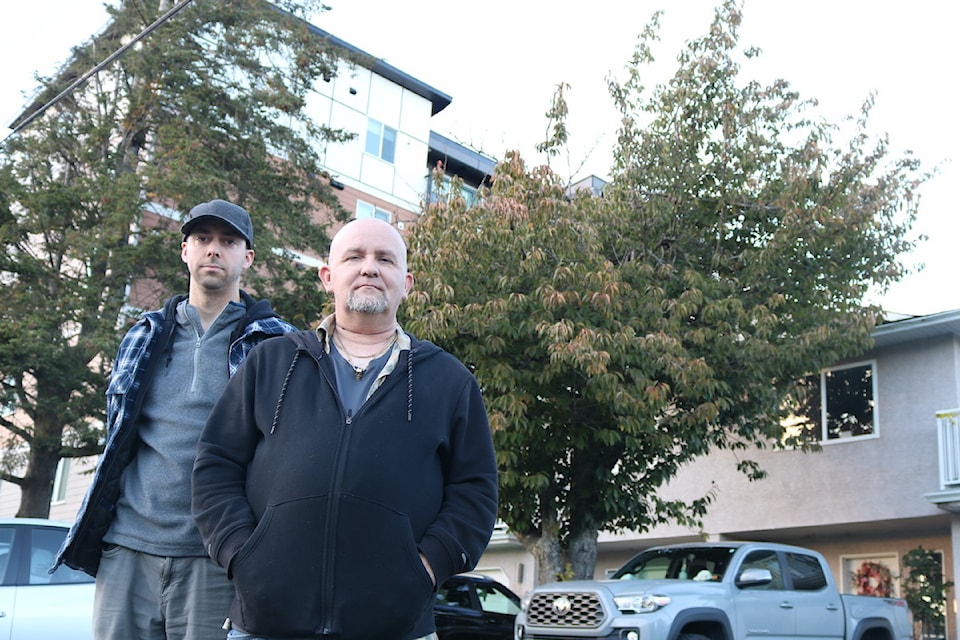 With one six-storey building already towering over their duplex property on one side, neighbours Stan Schinners and Keegan MacKinnon now face the prospect of a second building on the other side.