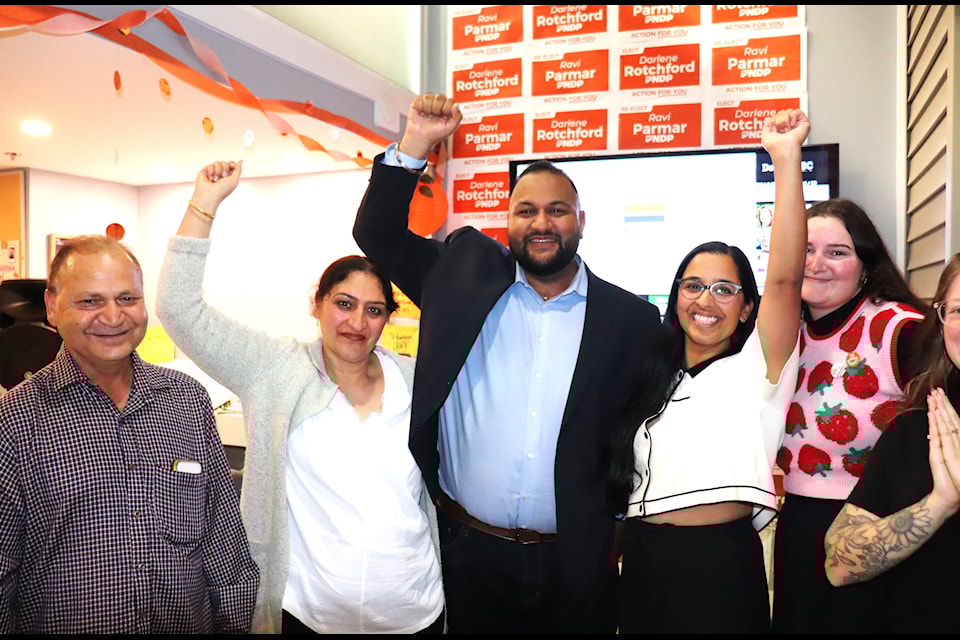 Ravi Parmar celebrates his victory with his campaign supporters.
