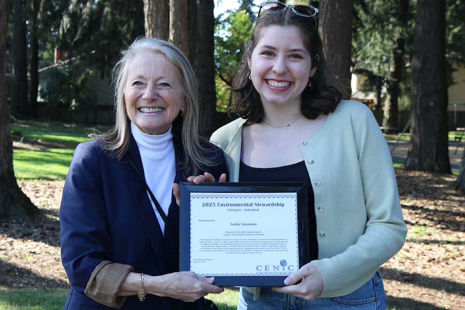CENIC's Carol Brown presents Taylor Gossman with her environmental stewardship award.