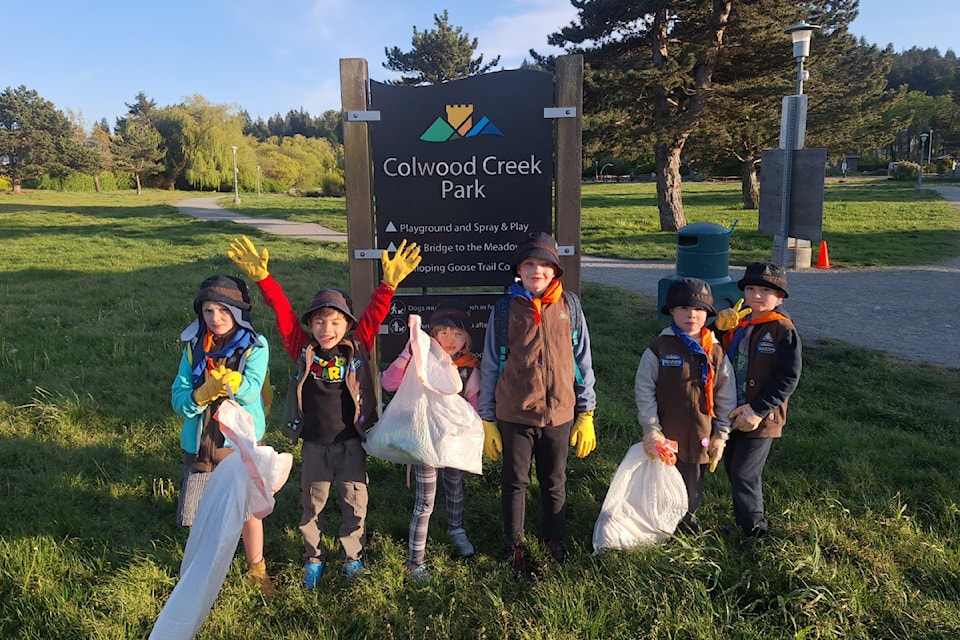 The 10th Juan de Fuca Beaver Scouts, Lachlan Mackie Lenk, Caleb Swan, Bella Peers,Henryk Filip-Plonka, Myles Lloyd and Michael Boutin, clean up Colwood Creek Park on April 29.