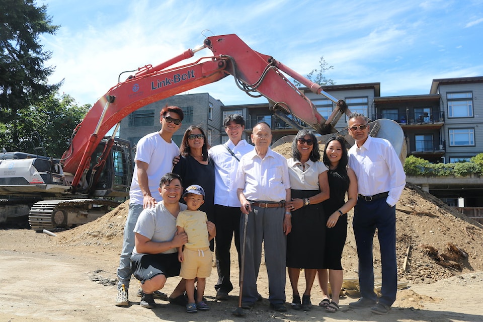 Four generations of the Chu family celebrate the start of their new legacy – a new hotel in downtown Langford.