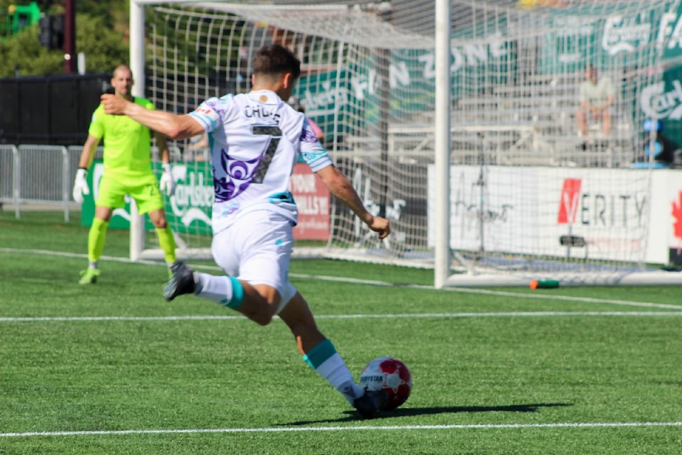 Pacific FC defender Kadin Chung scans for an attacking run during second-half play.