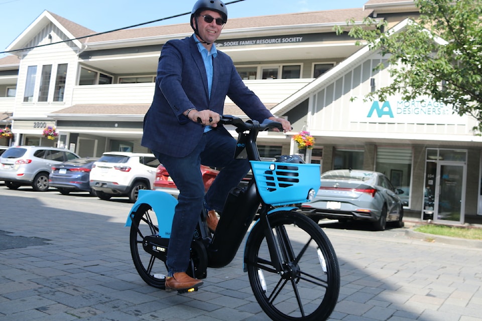Mayor Scott Goodmanson goes for a spin on an e-bike.