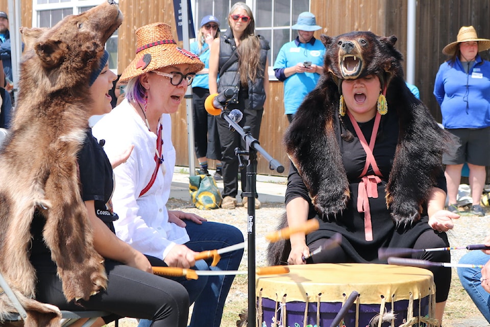 ANSWER2 drummers perform onshore at Esquimalt Lagoon.