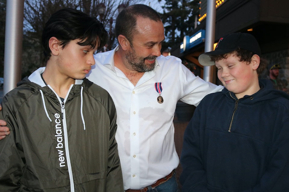 Brad Aschenbrenner with his two sons, 14-year-old Lucas and 11-year-old Emmitt.