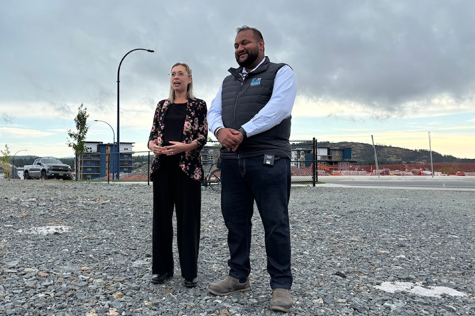 Sooke School District board chair Amanda Dowhy (left) and Langford/Juan de Fuca MLA Ravi Parmar (right) announcing the purchase of a 7.2-acre plot earmarked for the development of a middle school.