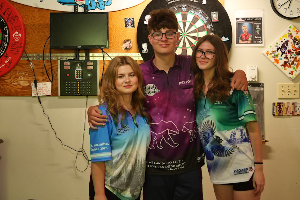 Jayda Hammond, Peyton Hammond and Lacey MacDonald are attending the World Dart Competition in Hungary.