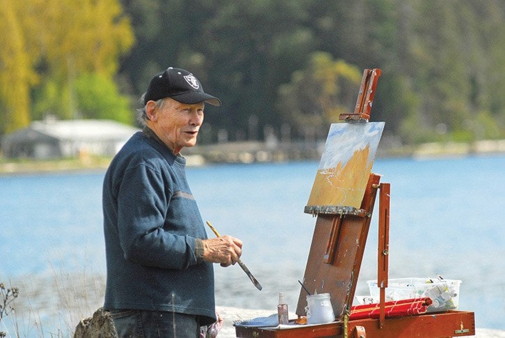 Glen Chanin creates a work of art at the paint out at the Esquimalt Lagoon at the Coast Collective Arts Centre