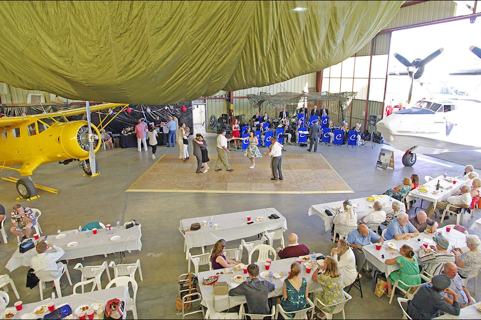 The hangar at Victoria Air Maintenance at the Victoria airport was host to music, dancing and fundraising for the Catalina Preservation Society. (Steven Heywood/News staff)
