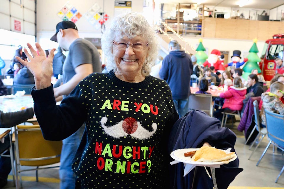 Helen Boyd is wearing her favourite Christmas sweater to the Santa breakfast. (Aaron Guillen/News Staff)
