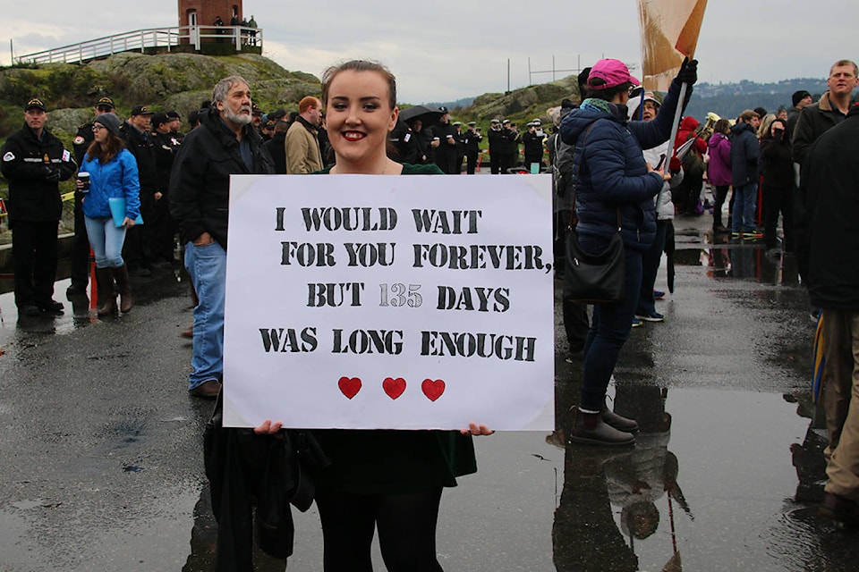 Karissa Brown waits for her partner, who’s been aboard the HMCS Ottawa for the past four and a half months. (Kendra Crighton/News Staff)