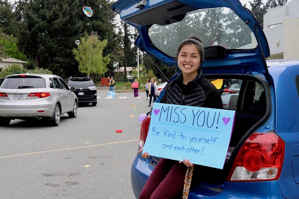 Grade 3 teacher Karlissa Lem is emotional seeing her students for the first time since saying goodbye before spring break. She hosted their first online class just days ago. (Aaron Guillen/News Staff)